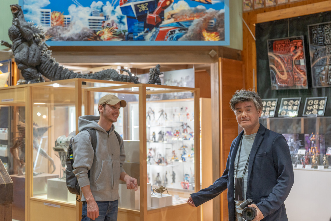 Kochi Insider guide with guest at Kaiyodo Hobby Museum Shimanto figure display