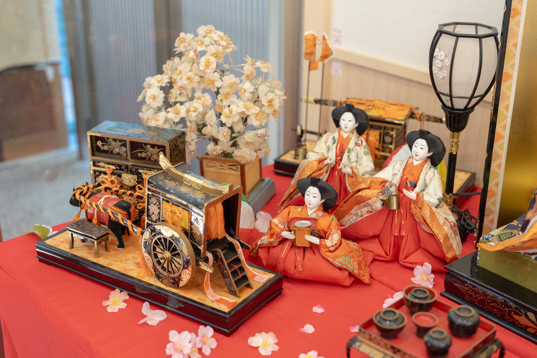 Visitor opening gachapon capsule figure at Kaiyodo Hobby Museum Shimanto entrance