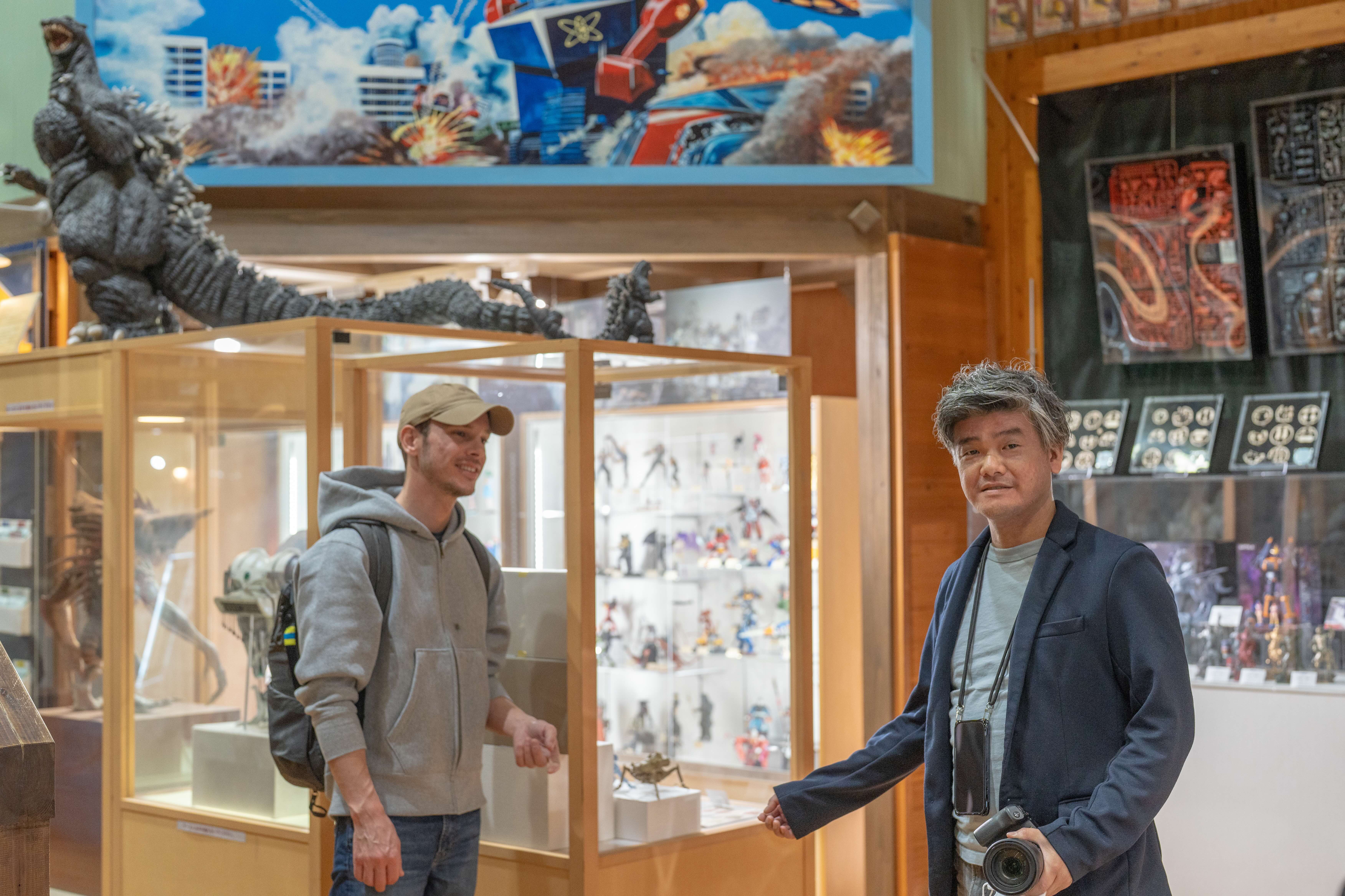 Hiroshi with guest at museum