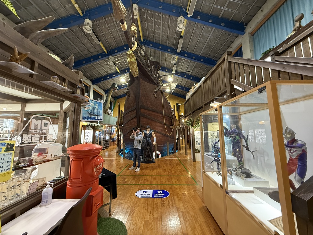 Interior of Kaiyodo Hobby Museum Shimanto with large Catalonian ship centerpiece and figure displays