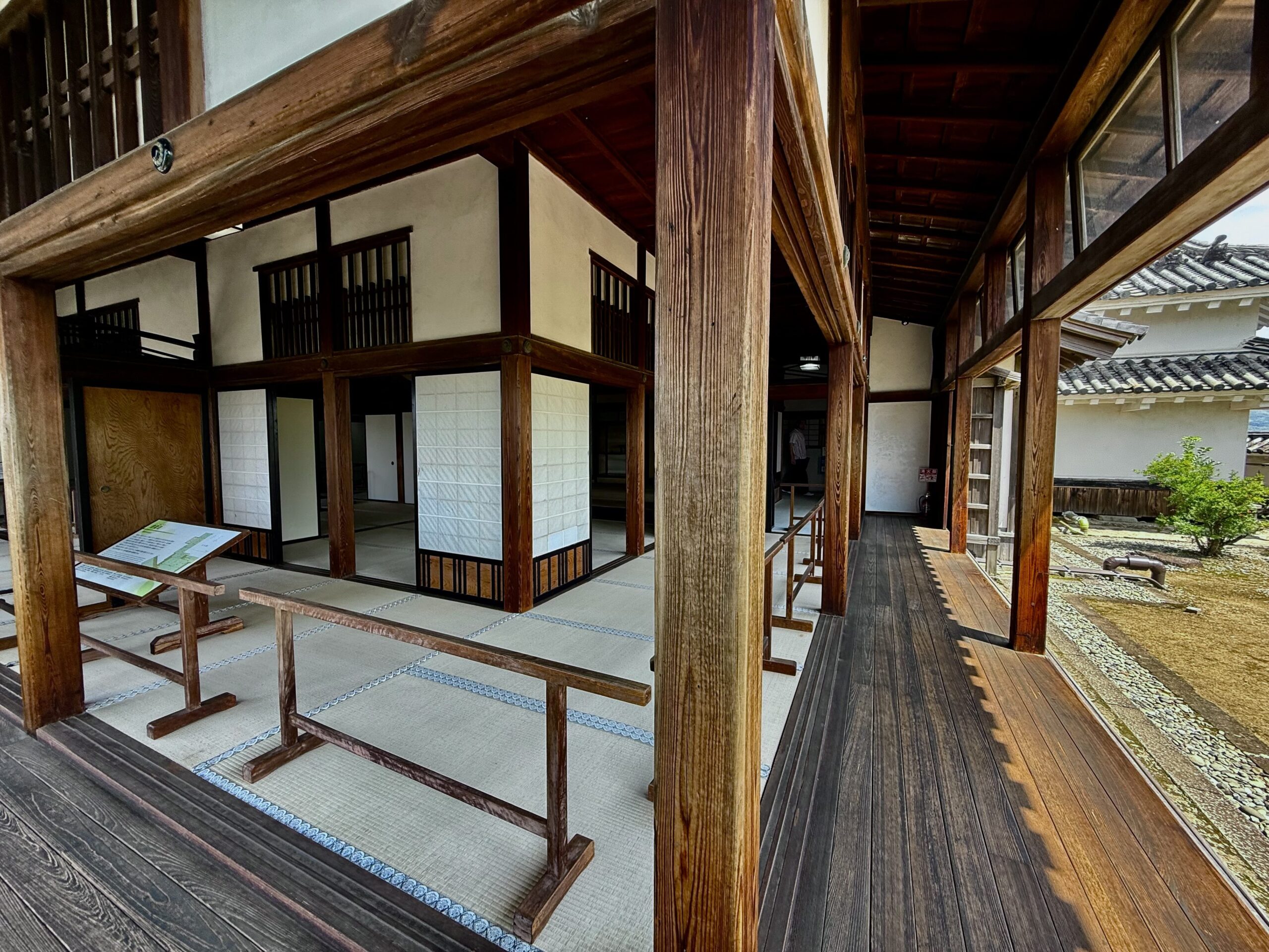 The traditional wooden veranda and tatami rooms of the Honmaru Palace at Kochi Castle