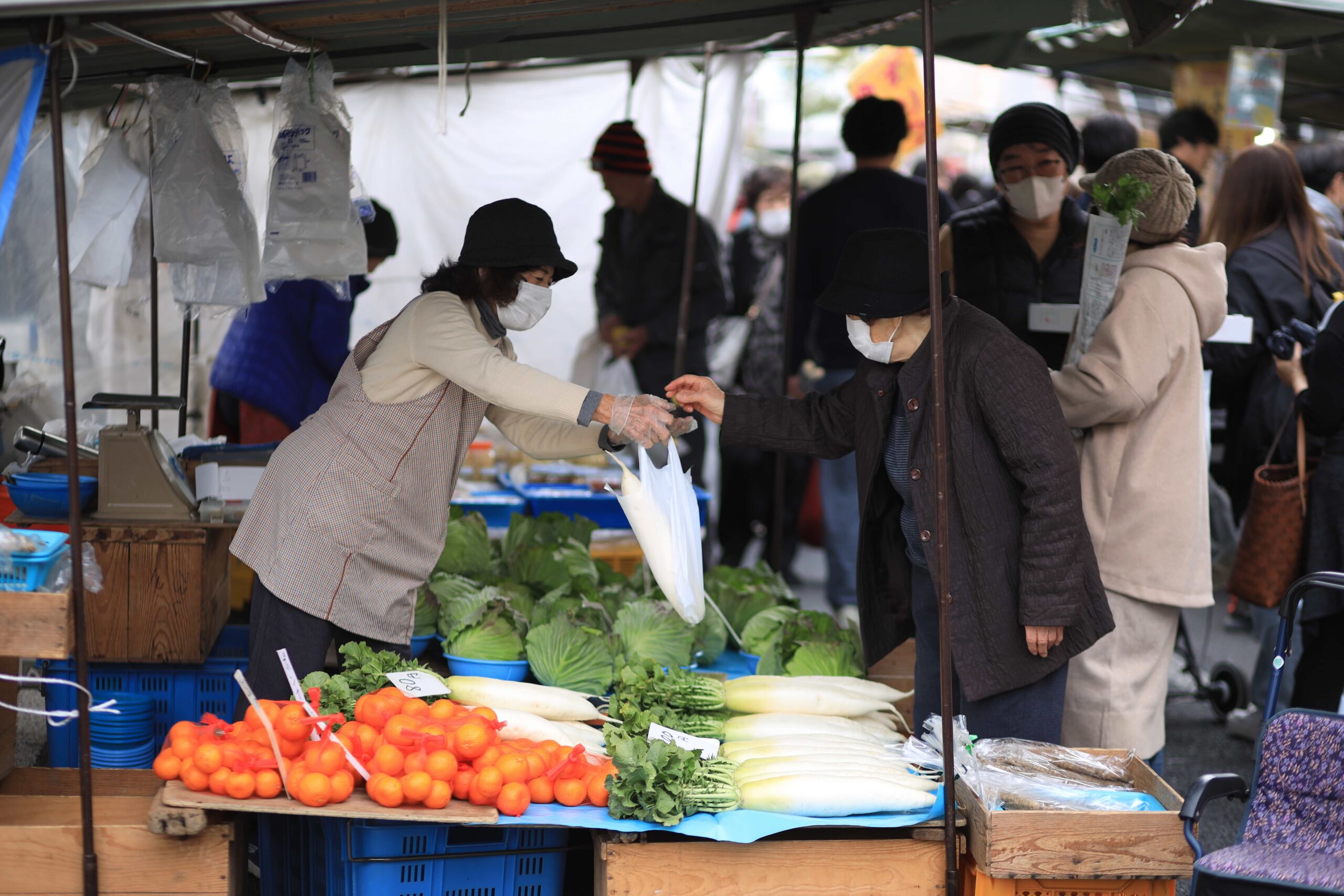 Aisu-kurin ice cream vendor at Kochi Sunday Market with iconic red and white signage