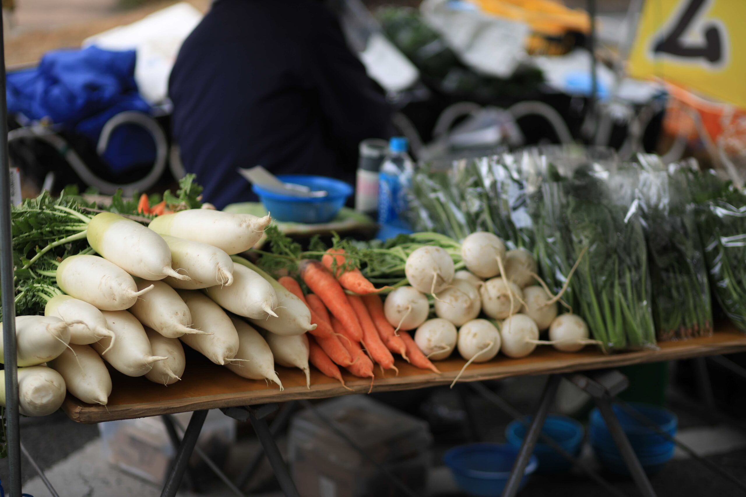Customer buying dried fish at Kochi Sunday Market stall