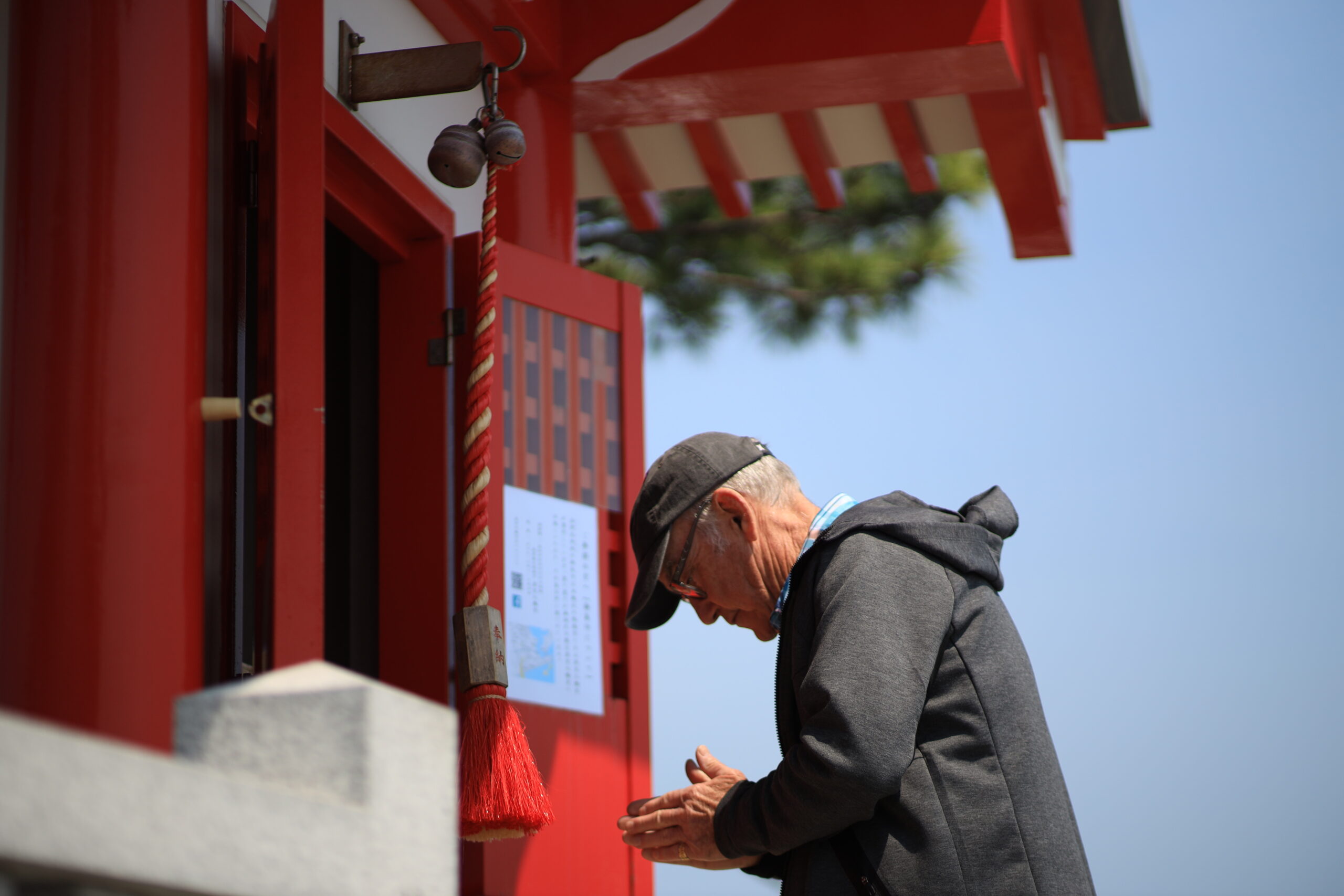 Praying at Ryugu Shrine