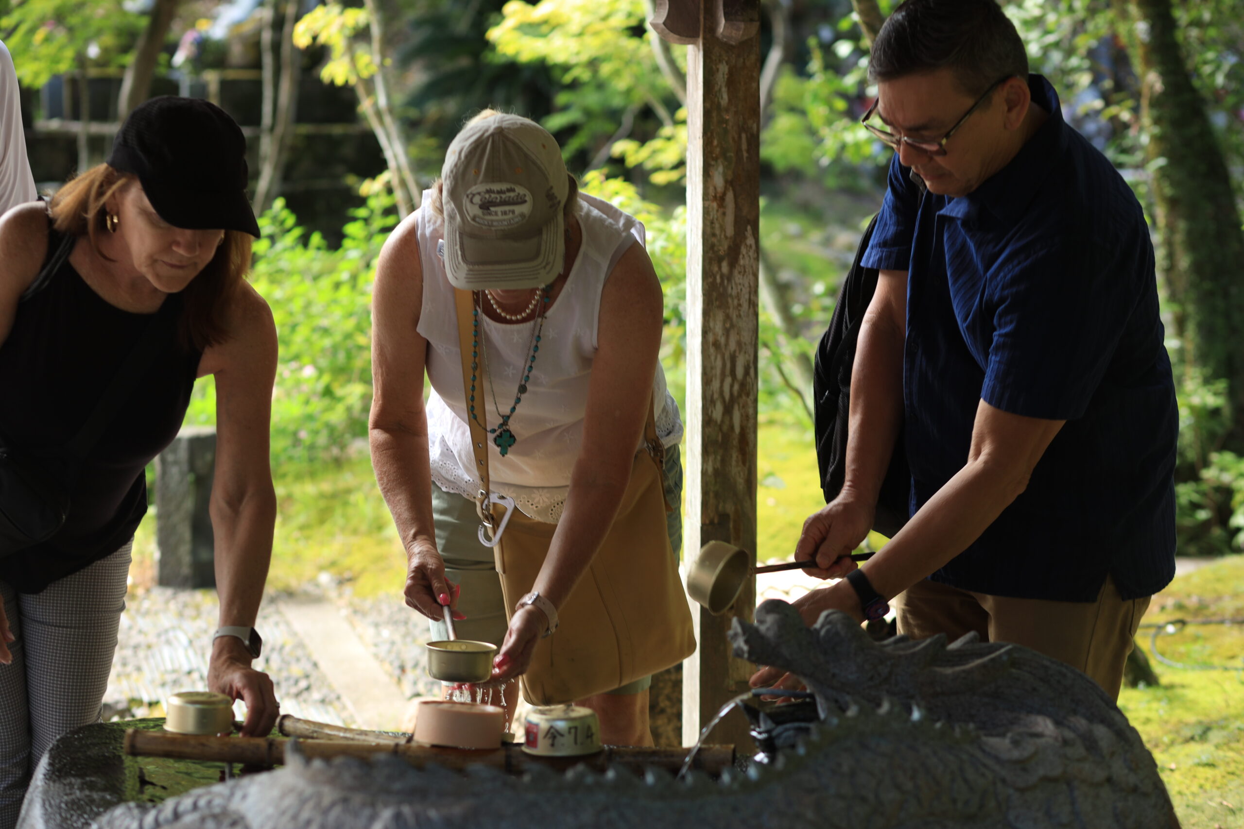 Learning the traditional water purification ritual