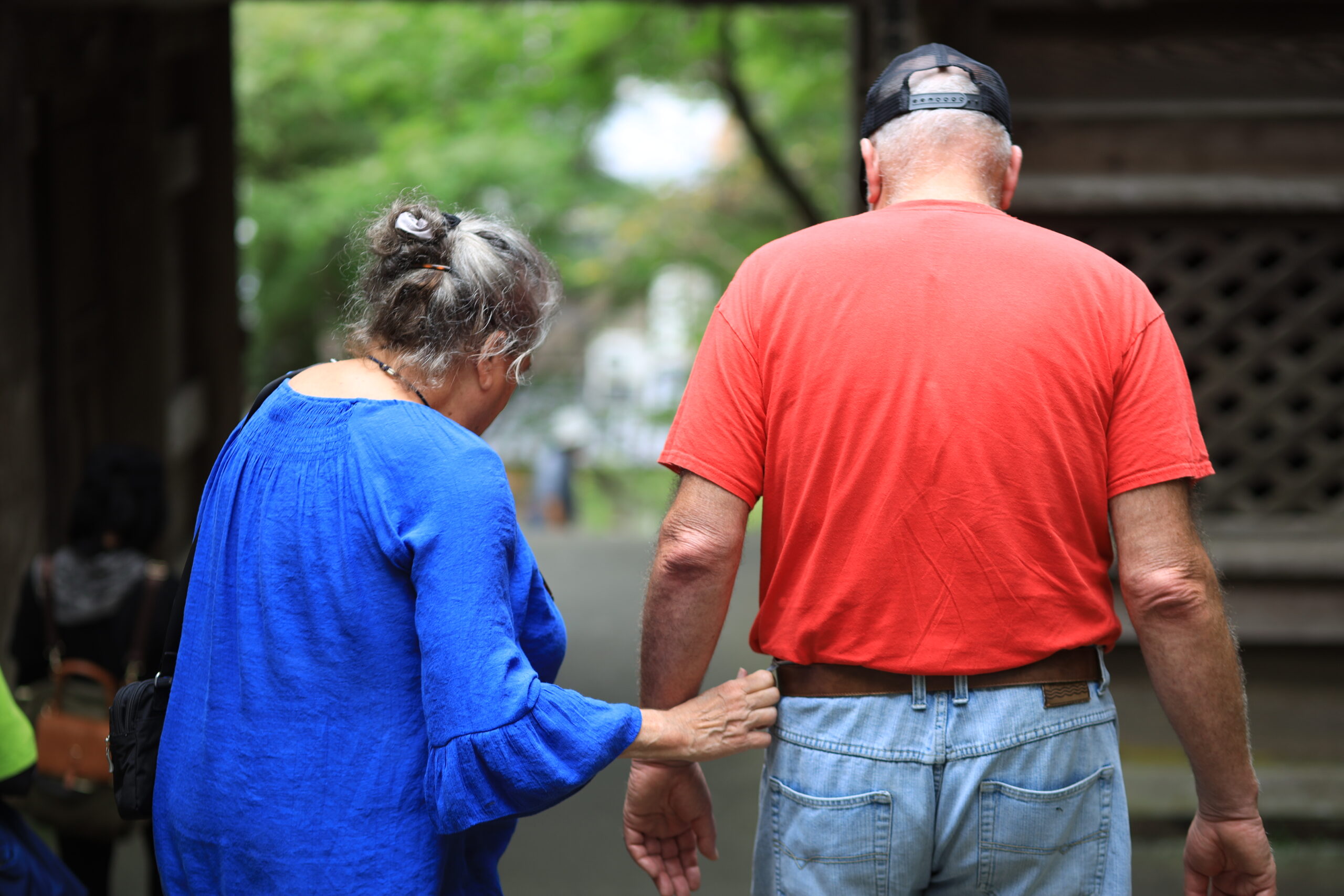 Couple walking arm in arm