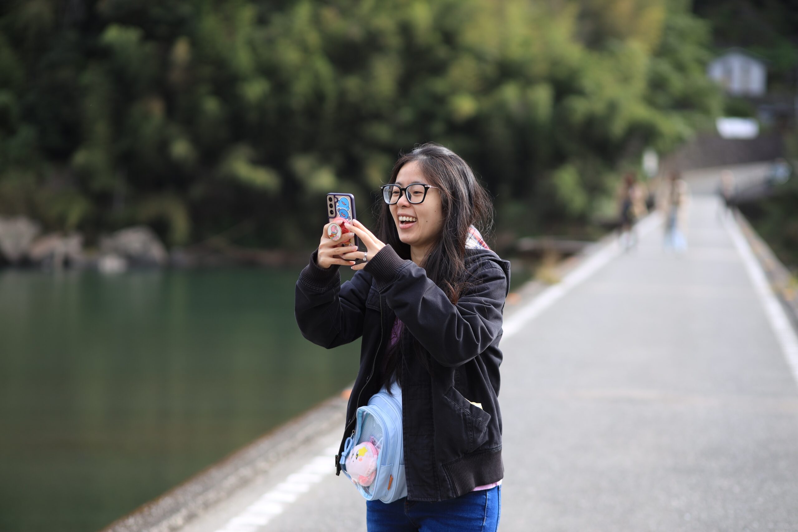 Guest photographing Niyodo River emerald green water