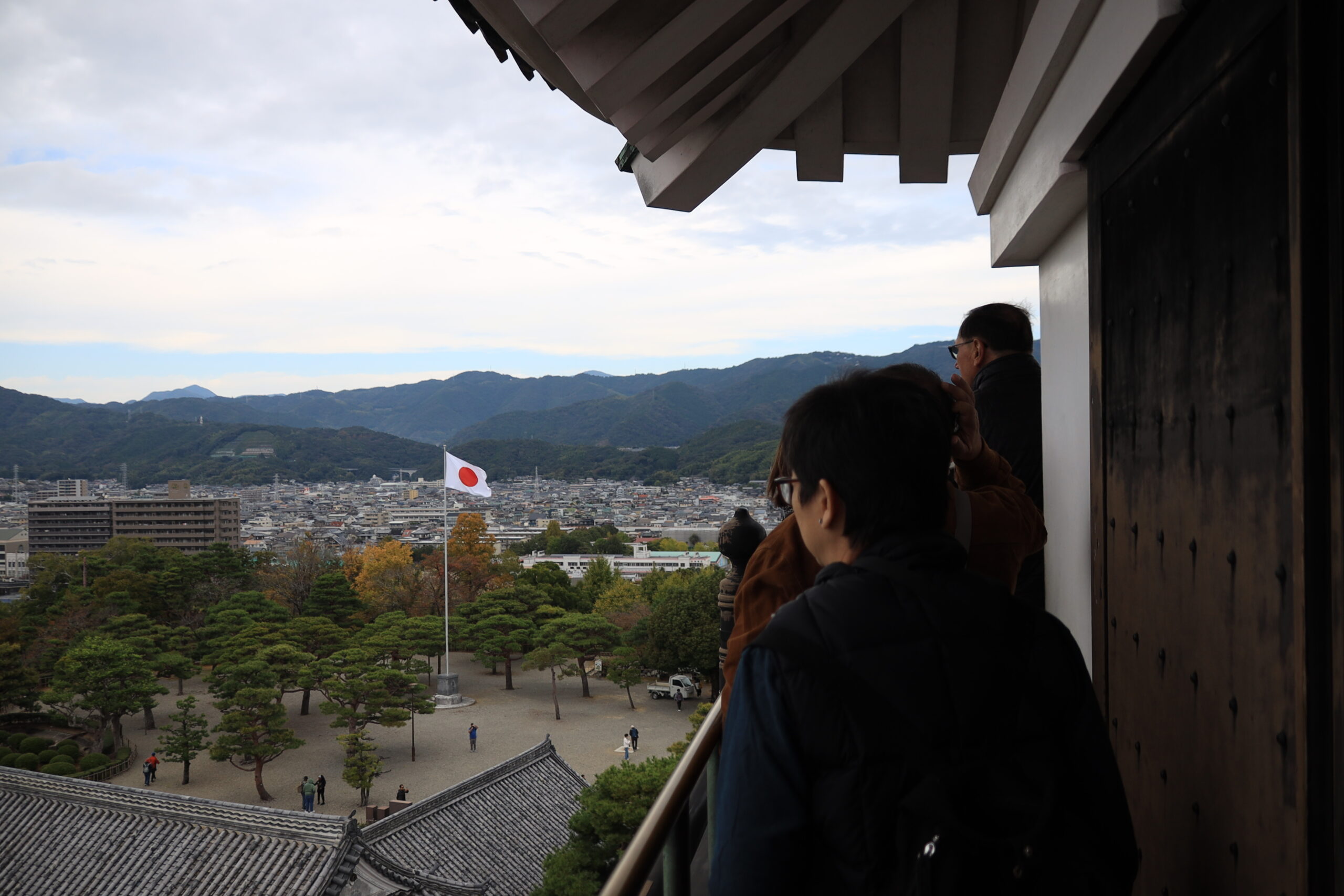 Happy tour guests at Kochi Castle — the climb is challenging but memorable