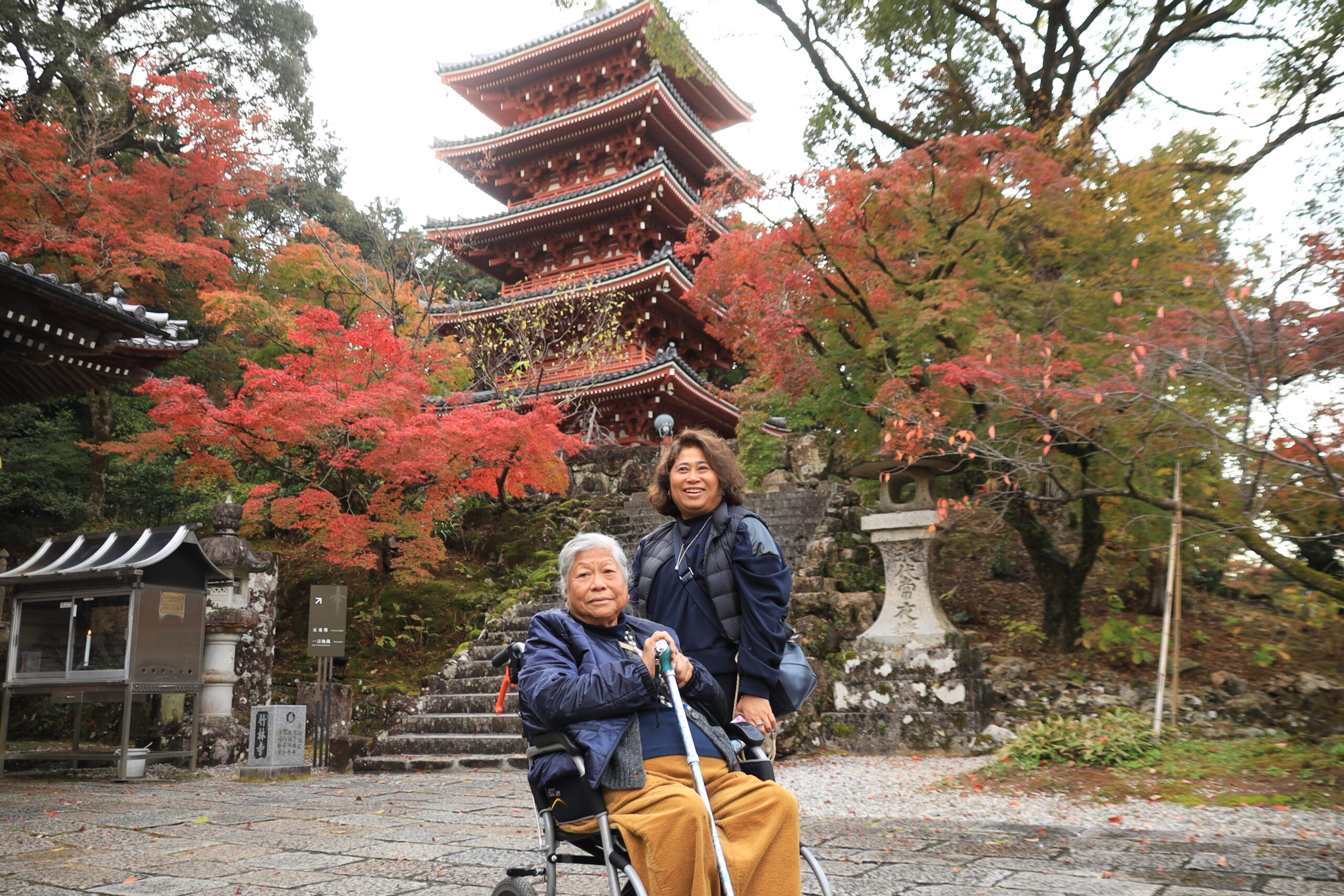 Wheelchair accessible visit at Chikurinji Temple five-story pagoda with autumn foliage