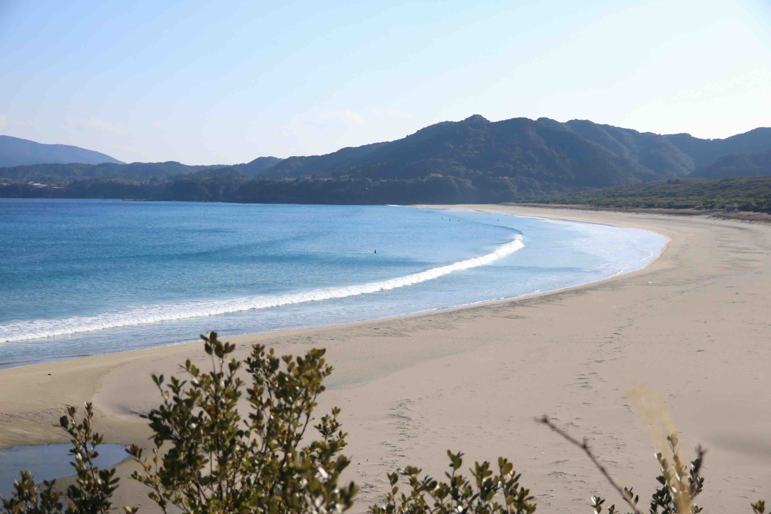 Oki Beach, a long curved white sand beach in Tosashimizu City near Cape Ashizuri