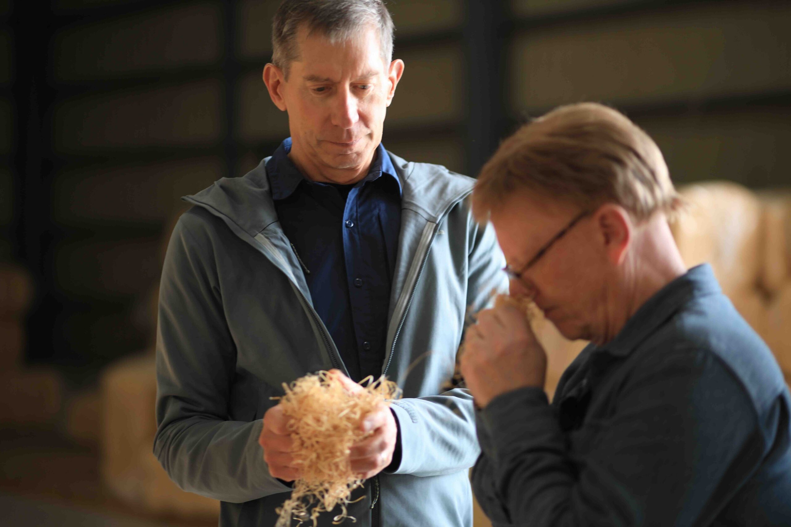 Guests smelling different types of wood wool at Toda Shoko