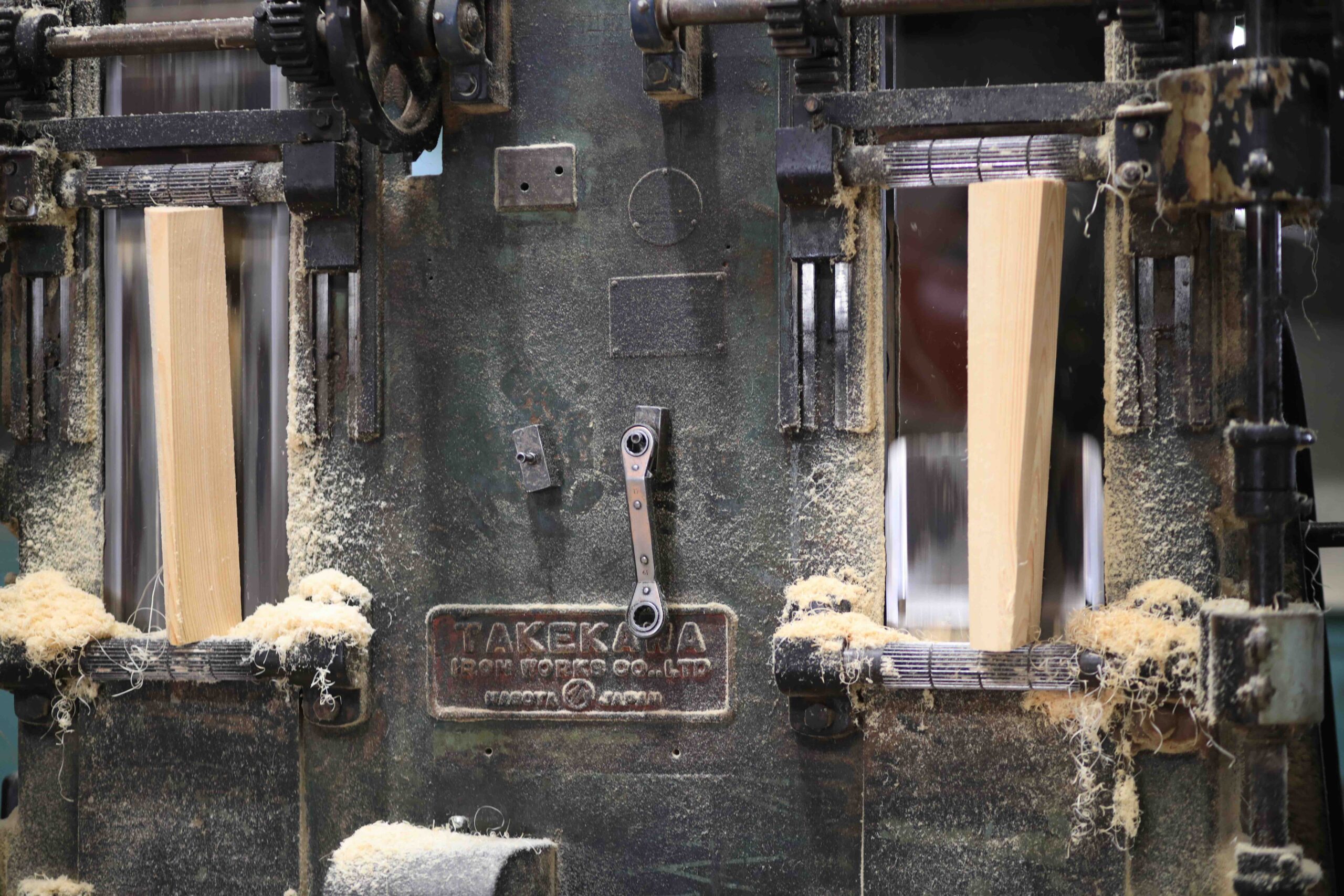 Close-up of the wood wool shaving machine at Toda Shoko
