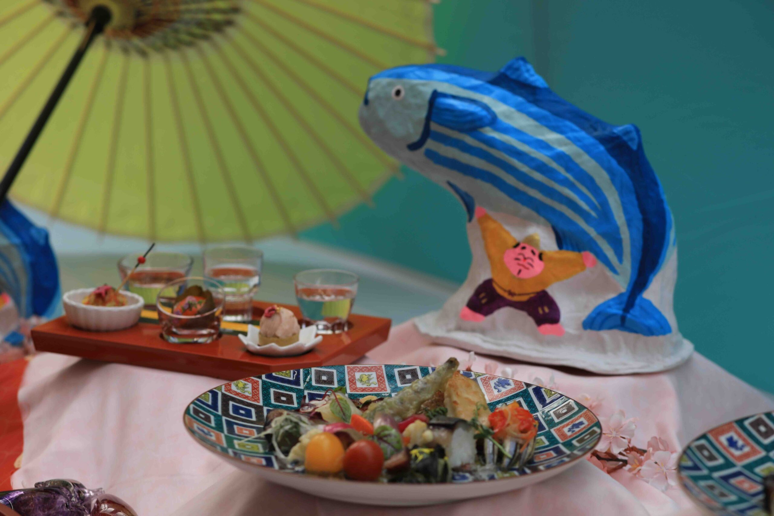 Creative sawachi display featuring a katsuo fish decoration with traditional tableware