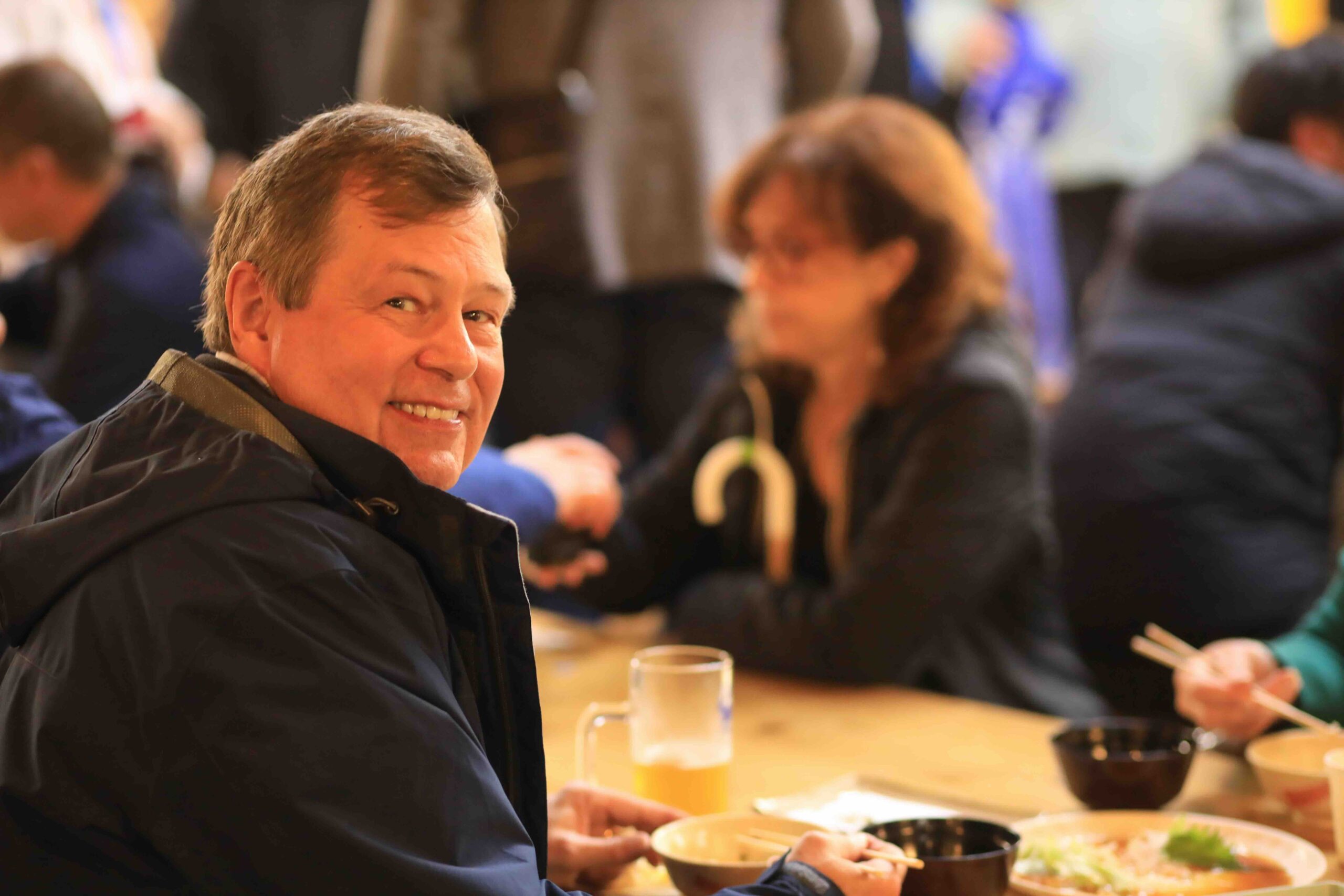Guest eating with chopsticks at Hirome Market Kochi Japan