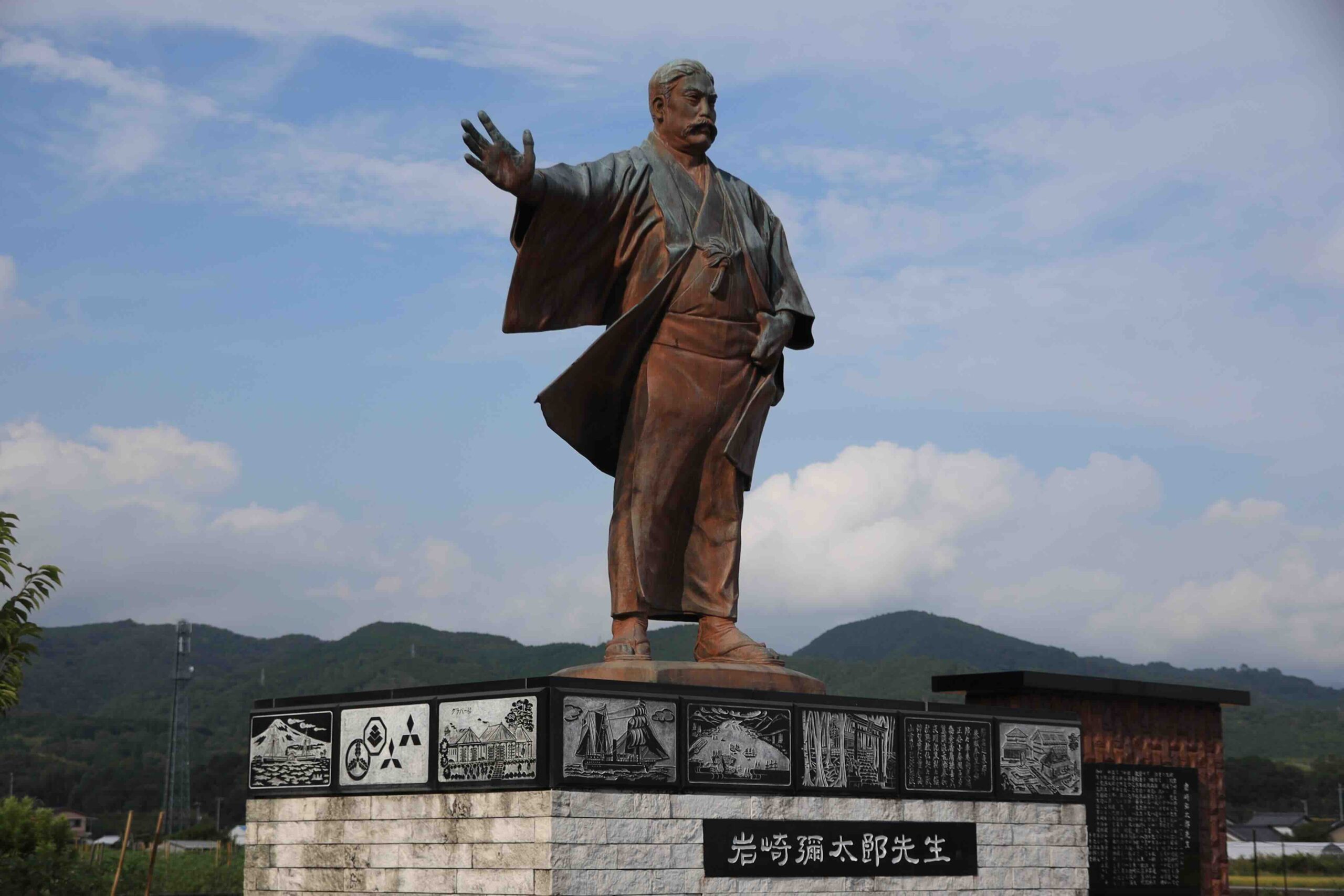 Bronze statue of Iwasaki Yataro founder of Mitsubishi with outstretched arm in Aki City Kochi
