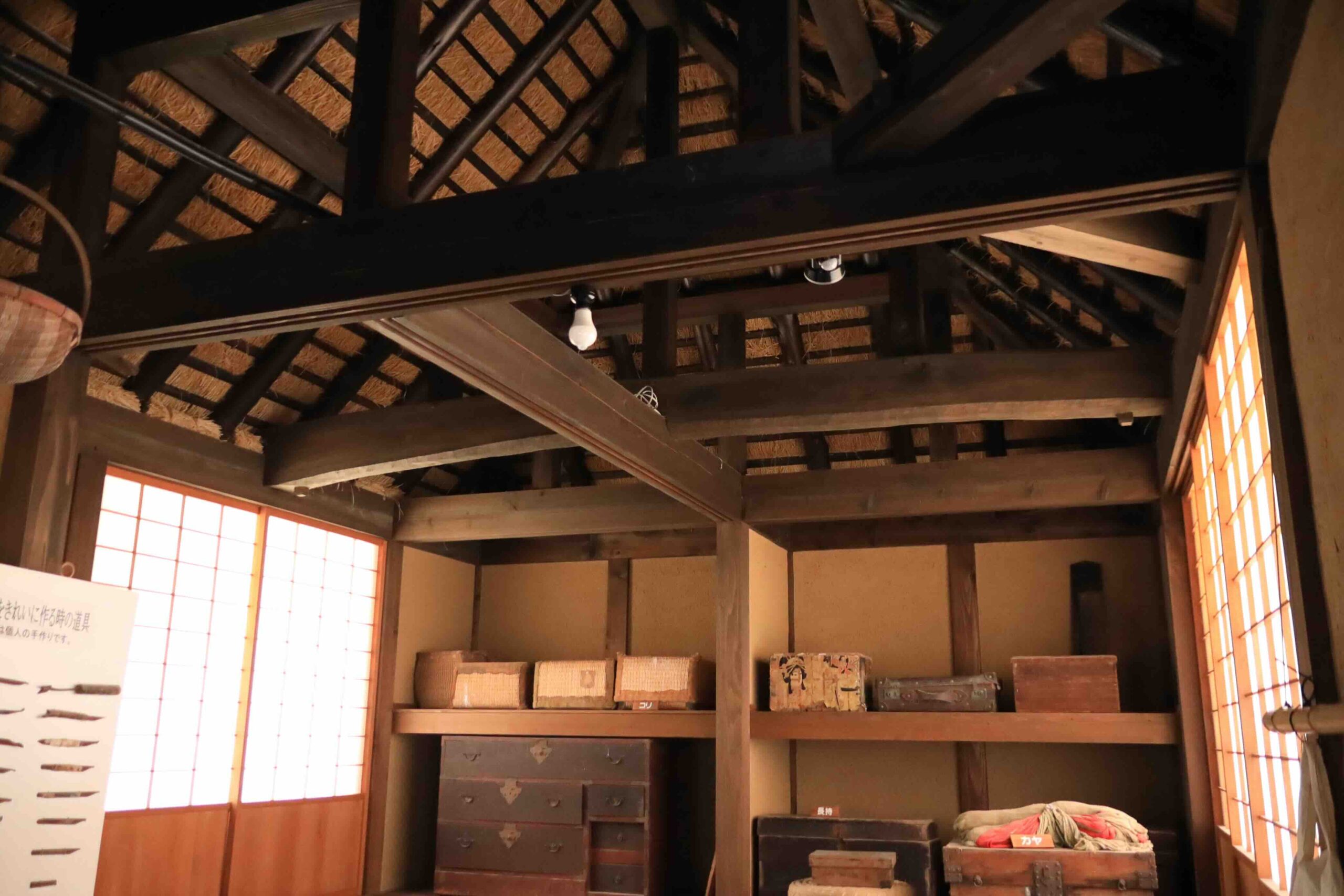 Interior thatched ceiling and wooden beam structure of Manjiro birthplace farmhouse in Tosashimizu Kochi