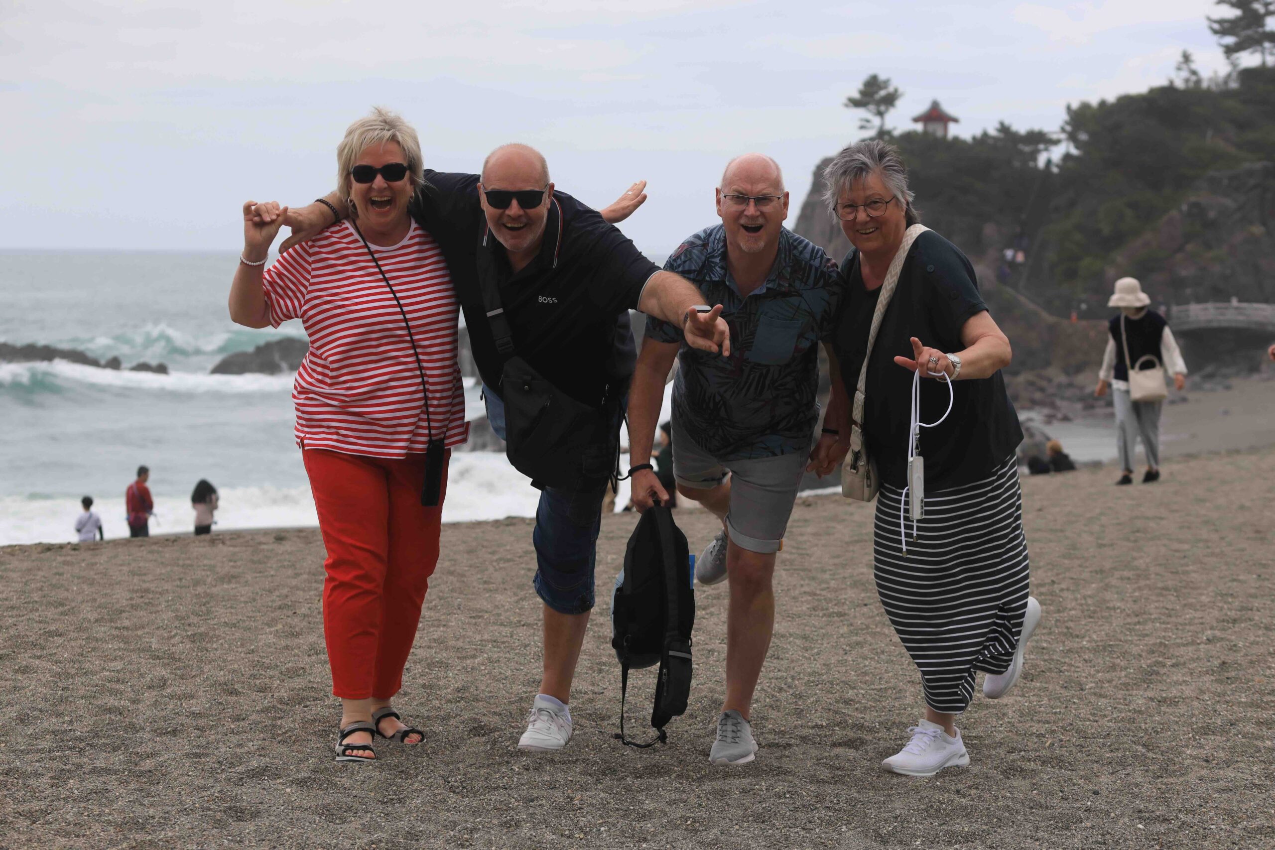 Four visitors from Germany enjoying Katsurahama Beach on the Pacific coast in Kochi